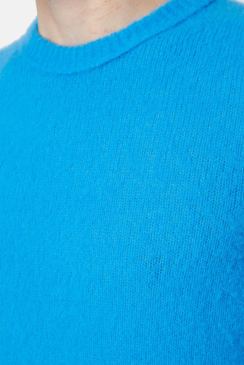 Pull en cachemire et soie bleu Roberto Collina