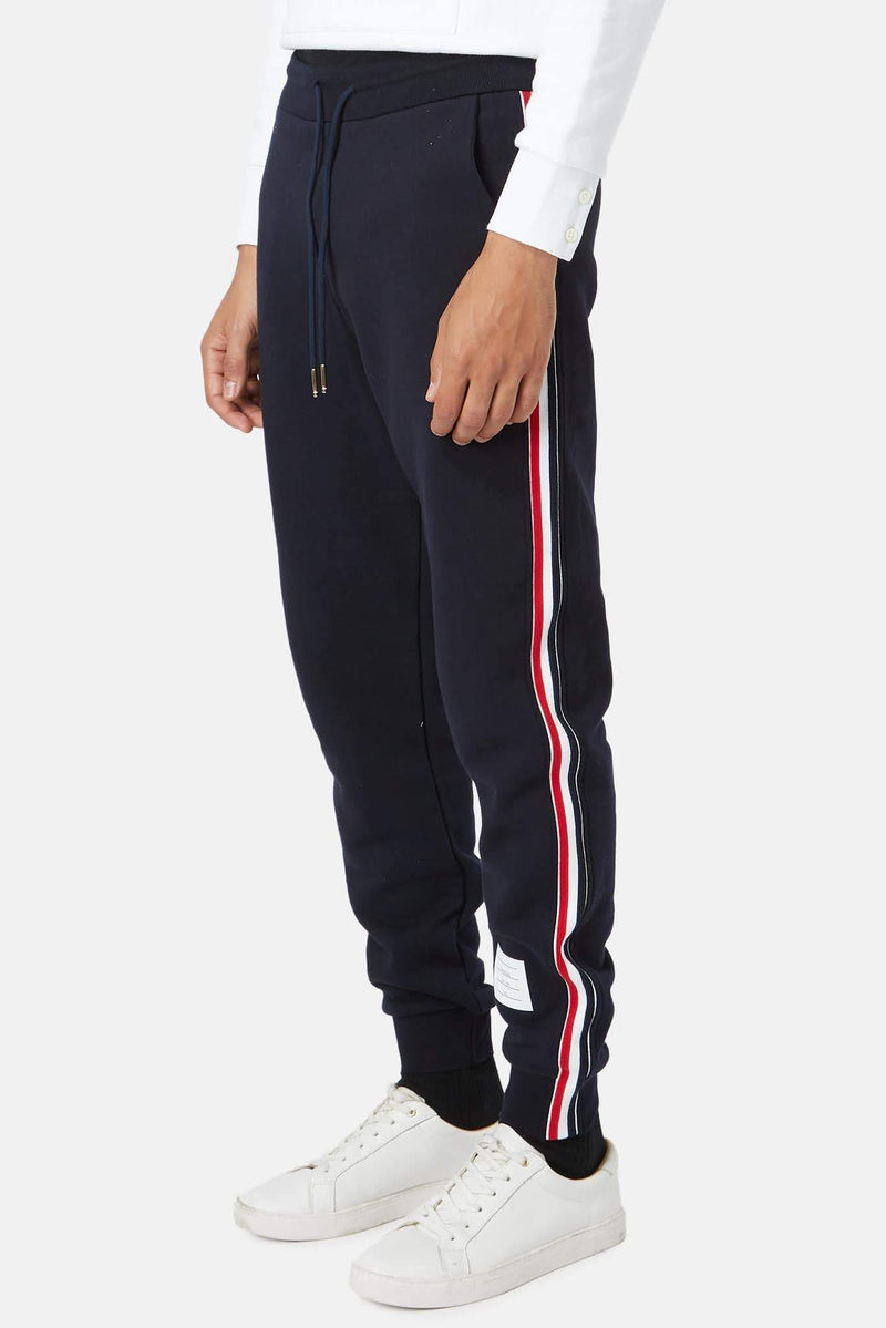 Pantalon de jogging en coton bleu marine Thom Browne