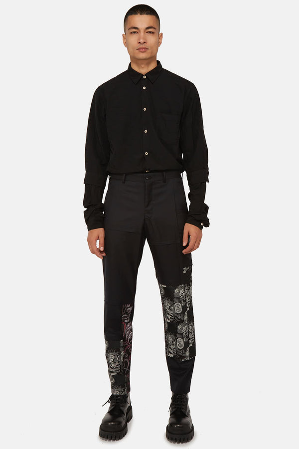 Pantalon à design asymétrique noir Comme des Garçons Homme Plus