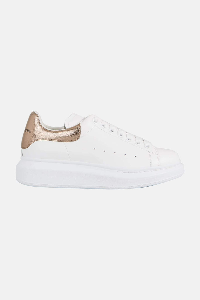 Baskets basses blanches et or rose Alexander McQueen