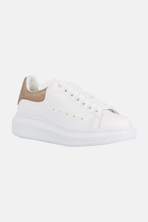 Baskets basses blanches et or rose Alexander McQueen