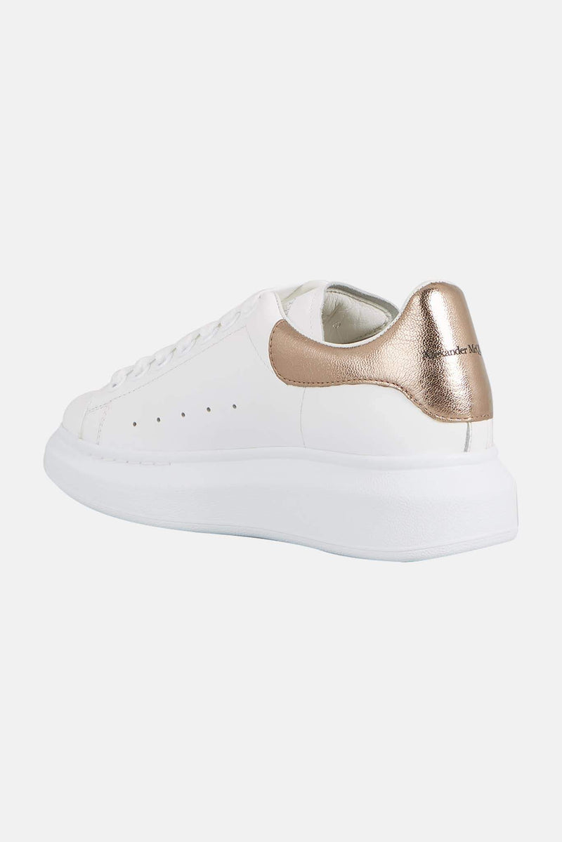 Baskets basses blanches et or rose Alexander McQueen