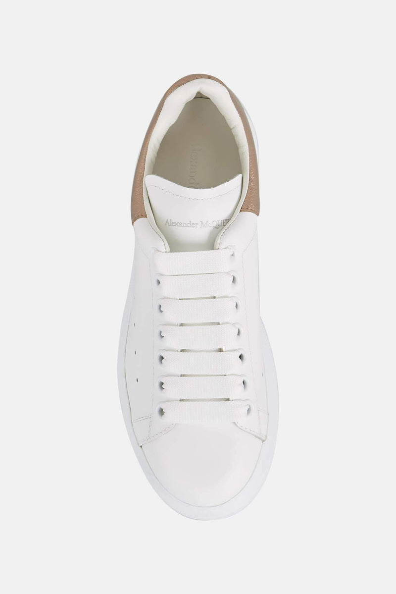 Baskets basses blanches et or rose Alexander McQueen