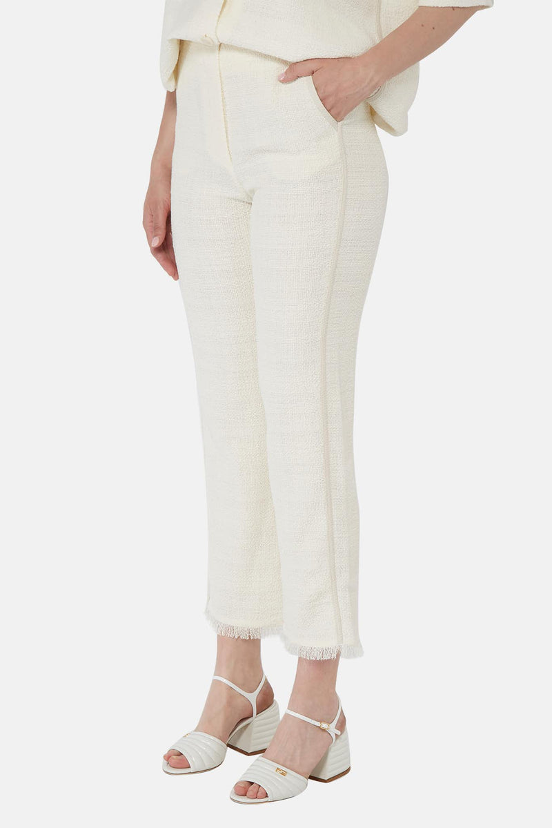 Pantalon texturé en coton et lin blanc cassé Nanushka