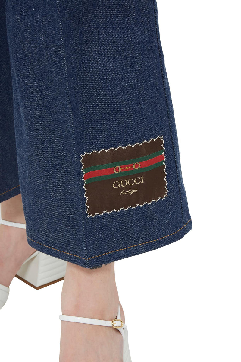 Jean bleu foncé avec étiquette "Gucci Boutique" Gucci