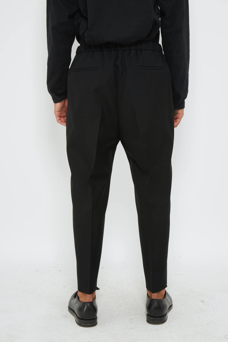 Pantalon à pinces en laine noire Jil Sander