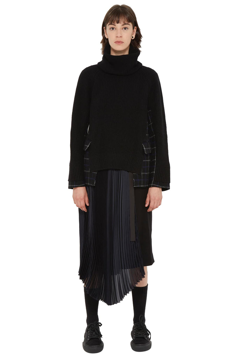 Pull en maille noire à empiècements contrastants Sacai