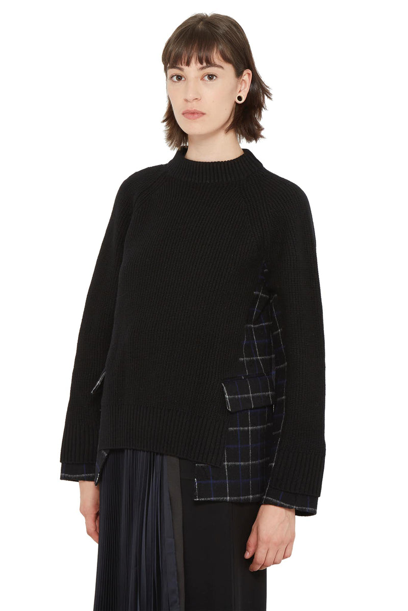 Pull en maille noire à empiècements contrastants Sacai