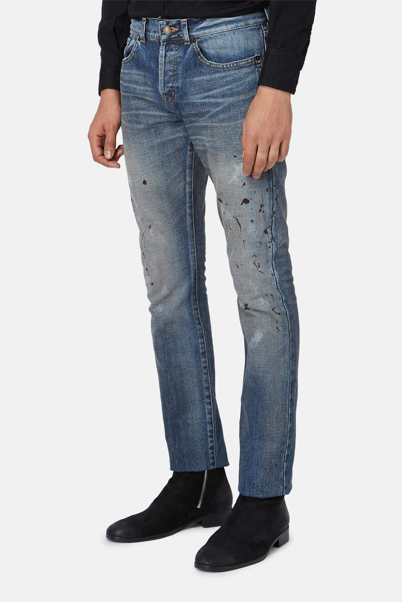 Jean effet usé en coton Saint Laurent